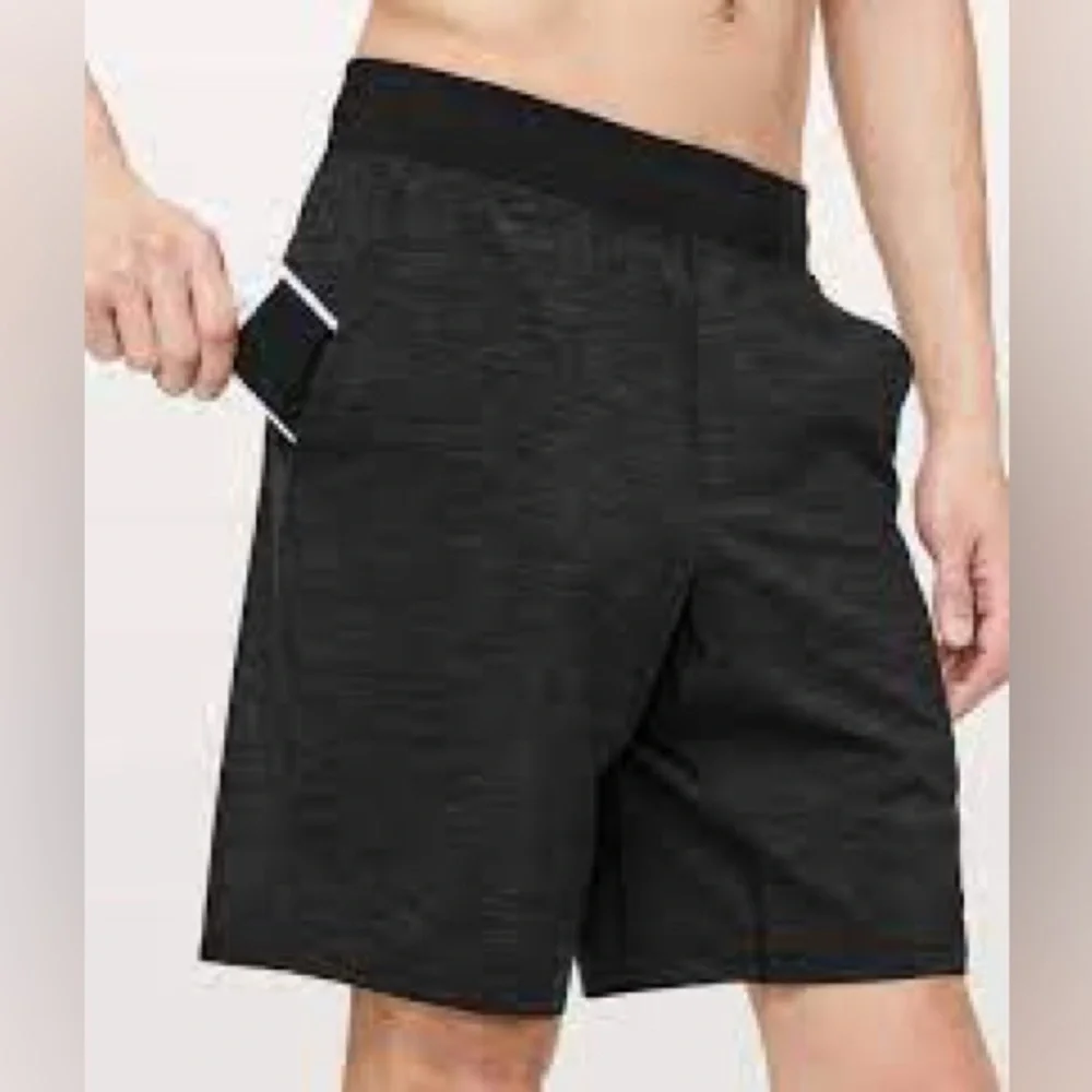 Lululemon The Short Linerless Hearthered Allover Deep Coal short